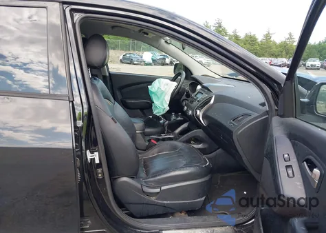 2010 Hyundai Tucson Limited z USA, uszkodzony, nr VIN KM8JUCAC0AU047182